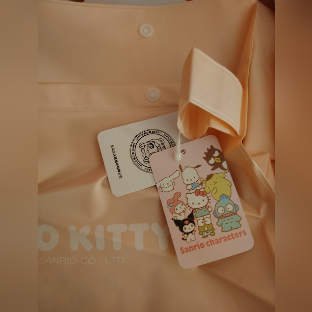 EXCLUSIVE - Hello Kitty Girl's Pink Hooded Raincoat & Storage Tote - Size XXXL - Picture 9 of 10